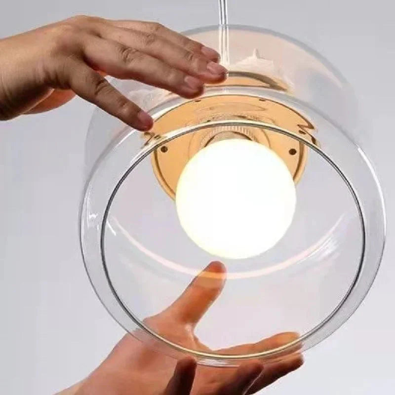 Avelora | Lampa wisząca z ptakiem i szklanym cylindrem