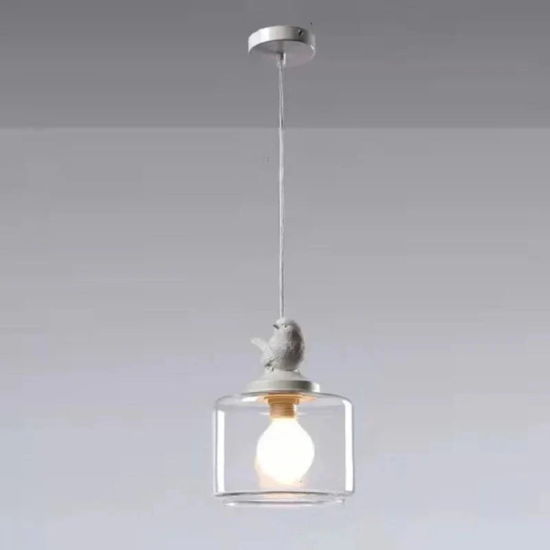 Avelora | Lampa wisząca z ptakiem i szklanym cylindrem