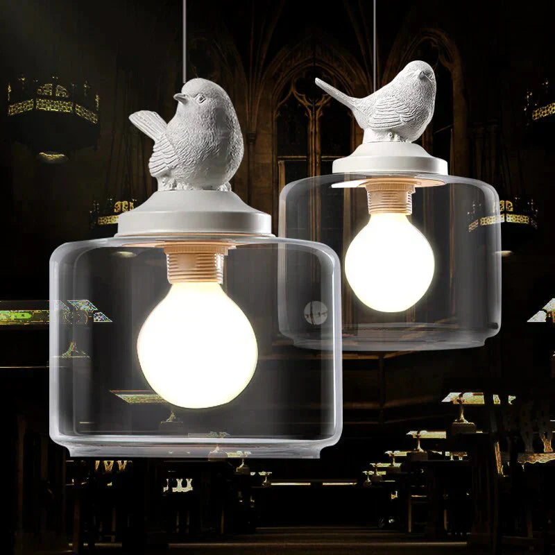 Avelora | Lampa wisząca z ptakiem i szklanym cylindrem