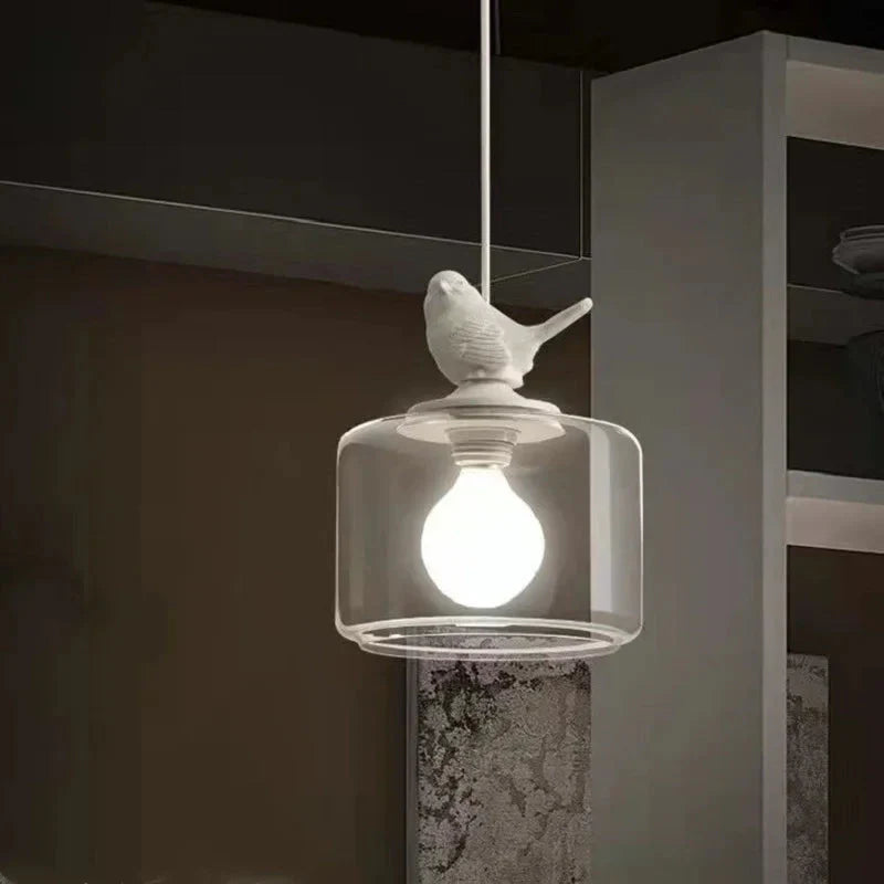 Avelora | Lampa wisząca z ptakiem i szklanym cylindrem