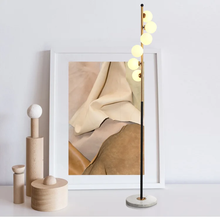Celestina | Designerska lampa podłogowa z kulistym światłem