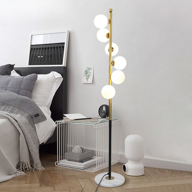 Celestina | Designerska lampa podłogowa z kulistym światłem